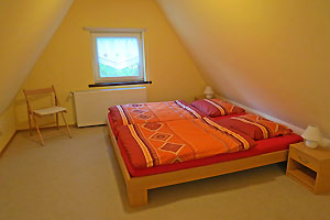 Ferienhaus im Spreewald: Schlafbereich mit Doppelbett