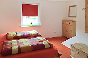 Ferienwohnungen im Spreewald: Schlafzimmer mit Doppelbett